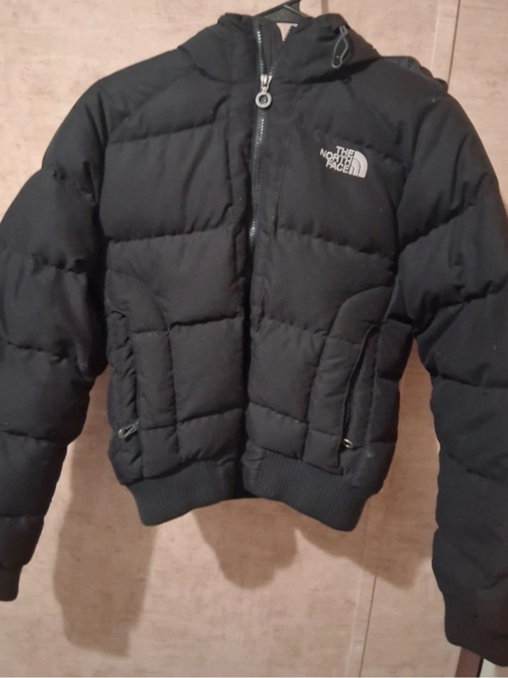 The North Face Women's Black Puffer Jacket
Hooded Size M/M